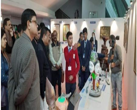 A memorable and inspiring moment when Honourable Education Minister Shri Dharmendra Pradhan observed my art model at the PPC event, Talkatora Stadium, New Delhi.”